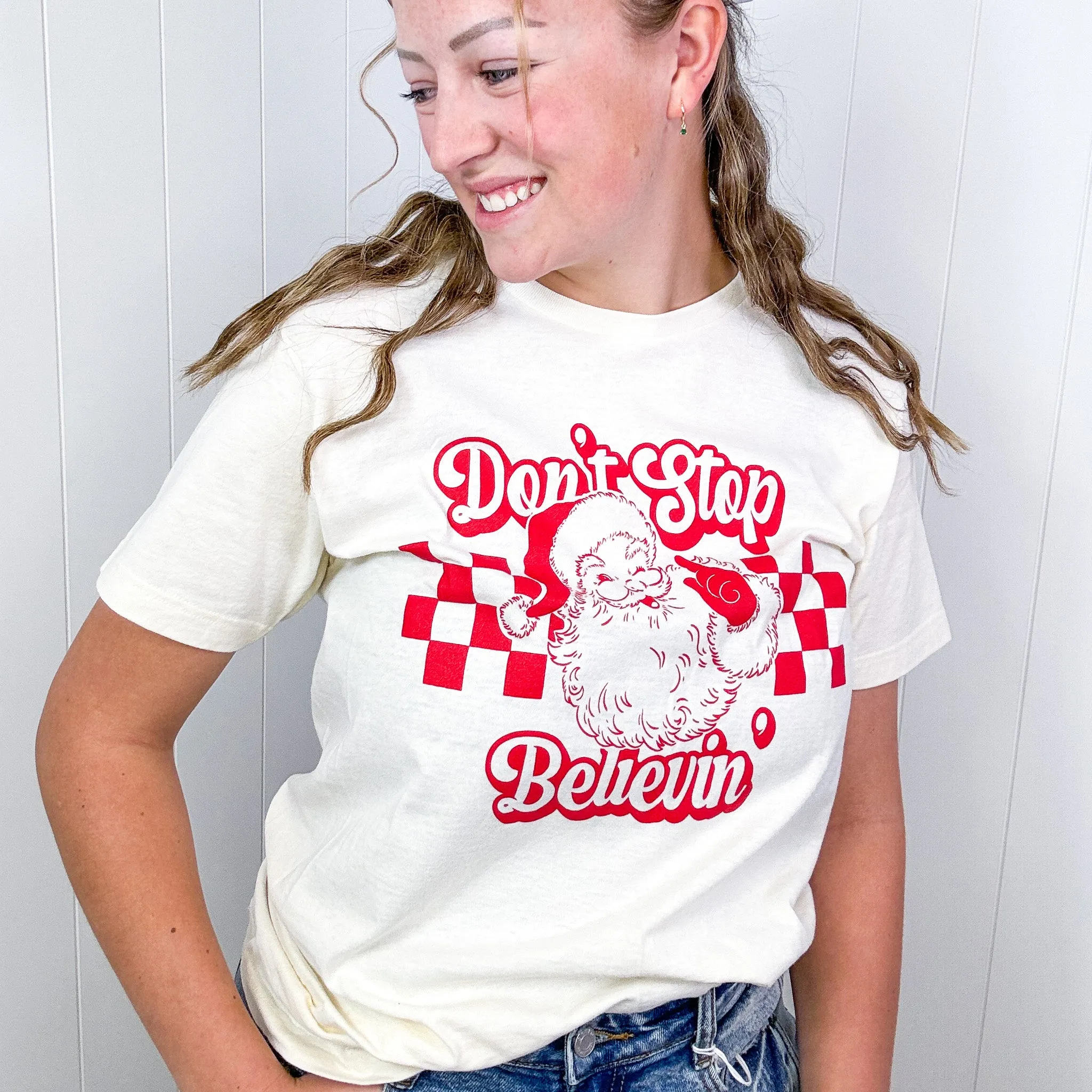 Don't Stop Believin' Santa Graphic Tee